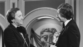With David Frost (left)