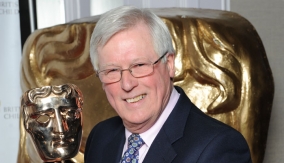 John Craven with the award