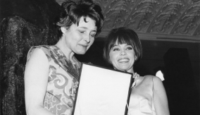 With Leslie Caron (r)