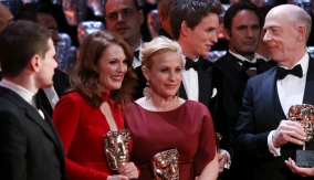 Arquette backstage with the winners